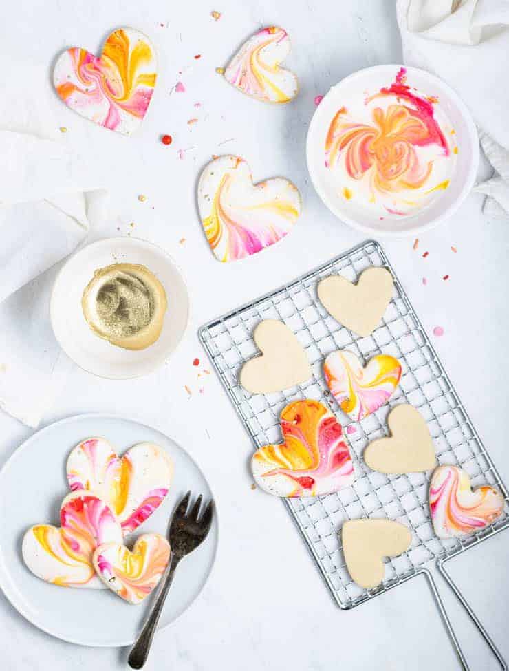Heart cookies on a cake rack.