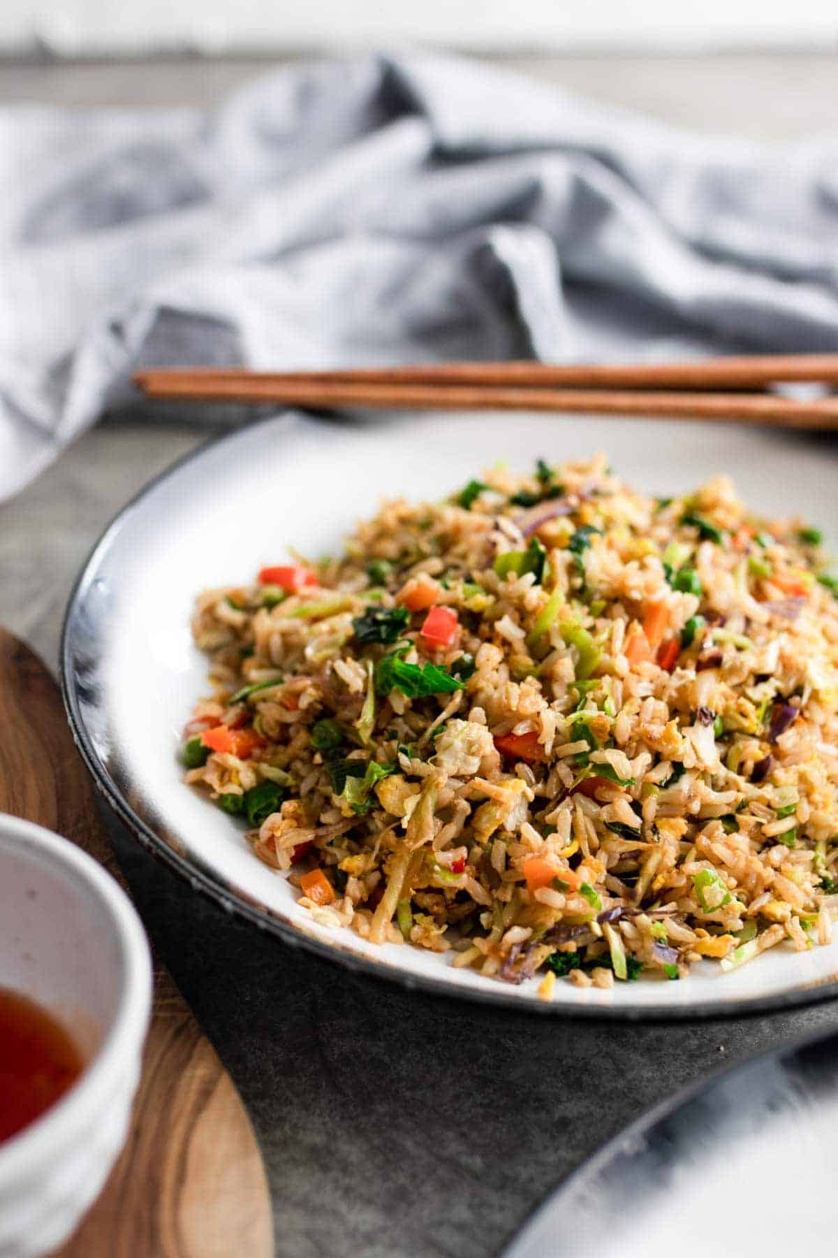 A plate of fried rice without soy sauce.