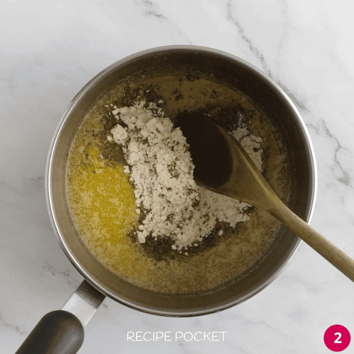 Melted butter in a saucepan, with flour. dried herbs and garlic.