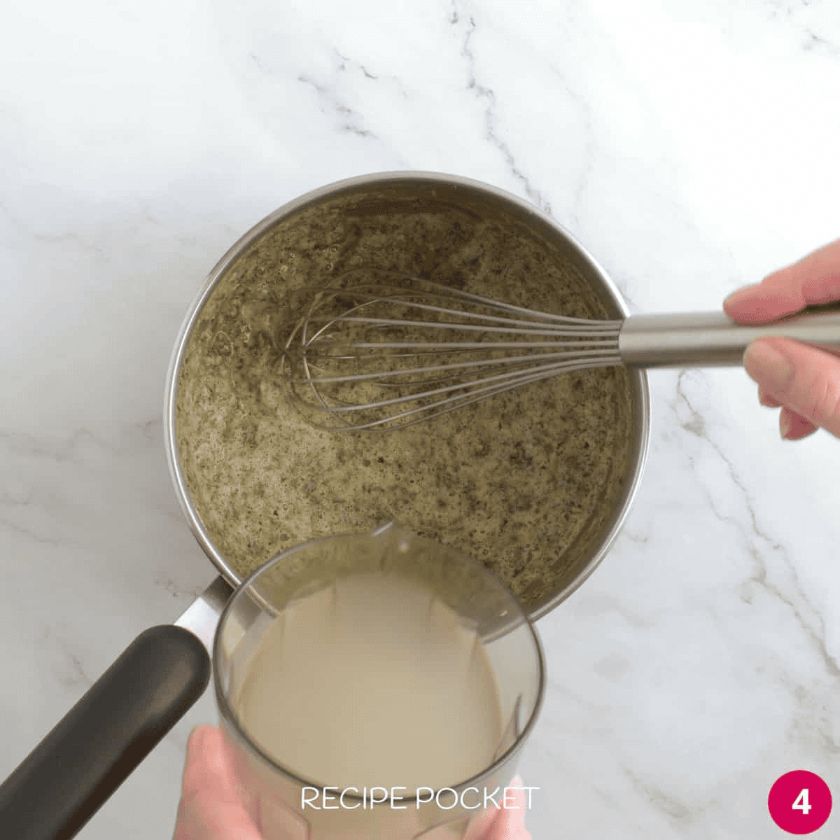 Stock being added to a roux.