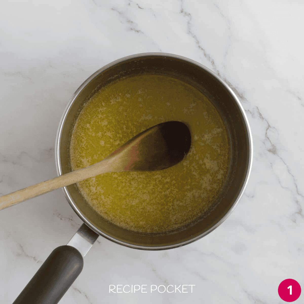 Melted butter in a saucepan.
