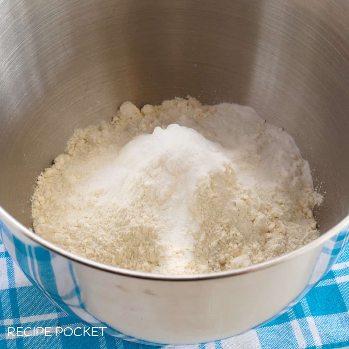 Dry ingredients for soft flour tortillas in a mixing bowl.