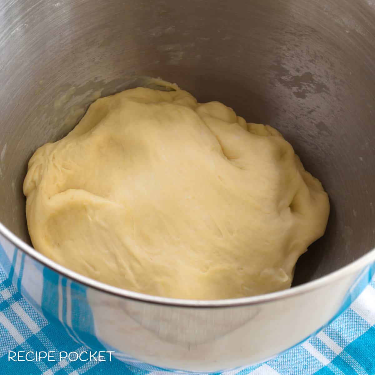 Tortilla dough in a bowl.