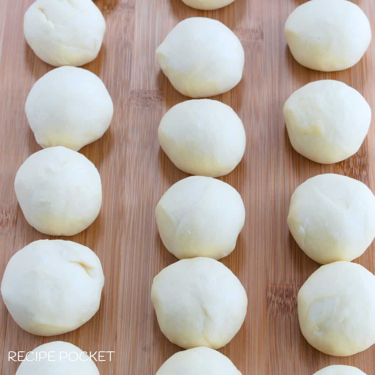 Tortilla dough shaped into small balls.